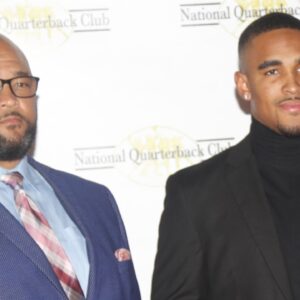 Oklahoma quarterback Jalen Hurts (center) with his father Averion Hurts (L) and his brother Averion Hurts Jr. (R) before the National Quarterback Club Awards Dinner & Hall of Fame Induction Ceremony The Scottsdale Resort at McCormick Ranch in Scottsdale, Ariz. on January 19, 2019.
