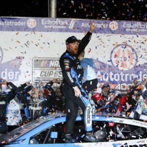 NASCAR driver Tyler Reddick celebrates the win at EchoPark Speedway.