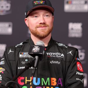 Feb 11, 2026; Daytona Beach, Florida, USA; NASCAR Cup Series driver Tyler Reddick (45) speaks to the media during the Daytona 500 Media Day at Daytona International Speedway