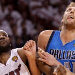 LeBron James, left, and Dirk Nowitzki jockey for position under the basket during Game 6 of the NBA, Basketball Herren, USA Finals between the Miami Heat and the Dallas Mavericks at the AmericanAirlines Arena in Miami on June 12, 2011.