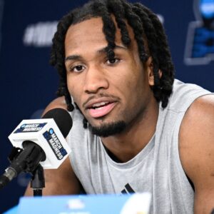 Mar 19, 2026; San Diego, CA, USA; Kansas Jayhawks guard Darryn Peterson (22) speaks at a news conference ahead of the first round of the men's 2026 NCAA Tournament at Viejas Arena