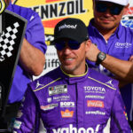 Mar 15, 2026; Las Vegas, Nevada, USA; Joe Gibbs Racing driver Denny Hamlin (11) celebrates his victory following the Pennzoil 400 at Las Vegas Motor Speedway. Mandatory Credit: Gary A. Vasquez-Imagn Images