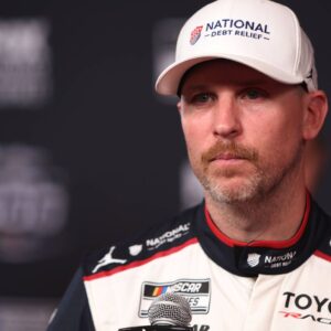 DAYTONA BEACH, FL - FEBRUARY 11: Denny Hamlin ( 11 Joe Gibbs Racing National Debt Relief Toyota) is being interviewed during Media Day for the NASCAR, Motorsport, USA Cup Series Daytona 500 on February 11, 2026 at Daytona International Speedway in Daytona Beach, FL