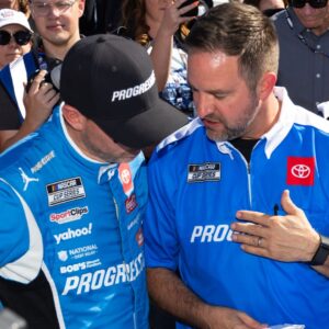 Nov 2, 2025; Avondale, Arizona, USA; NASCAR Cup Series driver Denny Hamlin (11) with crew chief Chris Gayle during the NASCAR Championship race at Phoenix Raceway.