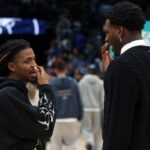 Memphis Grizzlies guard Ja Morant (left) and Utah Jazz forward Jaren Jackson Jr. (right) talk after a game at FedExForum