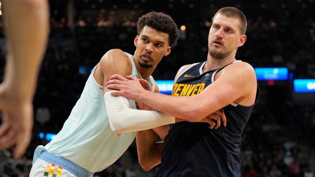 ; San Antonio Spurs center Victor Wembanyama (1) and Denver Nuggets center Nikola Jokic (15) battle for position during an inbound pass in the second half at Frost Bank Center