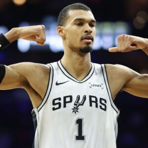 San Antonio Spurs forward Victor Wembanyama (1) reacts after his team scores against the Philadelphia 76ers during the second quarter at Xfinity Mobile Arena