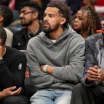 Washington Wizards guard Trae Young (3) watches from the bench during the game against the Atlanta Hawks during the second half at State Farm Arena