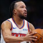 Mar 6, 2026; Denver, Colorado, USA; New York Knicks guard Jalen Brunson (11) lines up to take a shot in the third quarter against the Denver Nuggets at Ball Arena