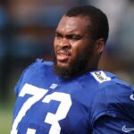 New York Giants offensive tackle Evan Neal (73) on the field during training camp at Quest Diagnostics Training Center.