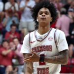 Alabama Crimson Tide guard Aden Holloway (2) reacts after his three pointer during the second half against the Auburn Tigers at Coleman Coliseum.