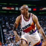 Unknown date 1996; Phoenix, AZ, USA; FILE PHOTO; Phoenix Suns forward Charles Barkley (34) is defended by Seattle Supersonics forward Detlef Schrempf (11) at America West Arena. Mandatory Credit: Imagn Images