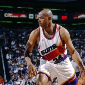 Unknown date 1996; Phoenix, AZ, USA; FILE PHOTO; Phoenix Suns forward Charles Barkley (34) is defended by Seattle Supersonics forward Detlef Schrempf (11) at America West Arena. Mandatory Credit: Imagn Images