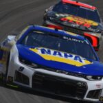 Mar 15, 2026; Las Vegas, Nevada, USA; Hendrick Motorsports driver Chase Elliott (9) leads Joe Gibbs Racing driver Chase Briscoe (19) during the Pennzoil 400 at Las Vegas Motor Speedway