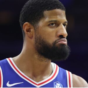 Jan 27, 2026; Philadelphia, Pennsylvania, USA; Philadelphia 76ers forward Paul George (8) looks on after a score against the Milwaukee Bucks during the fourth quarter at Xfinity Mobile Arena