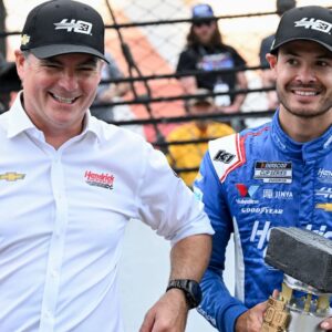 Jeff Gordon celebrates with NASCAR Cup Series driver Kyle Larson (5) after he won the Brickyard 400, Sunday, July 21, 2024, at Indianapolis Motor Speedway.