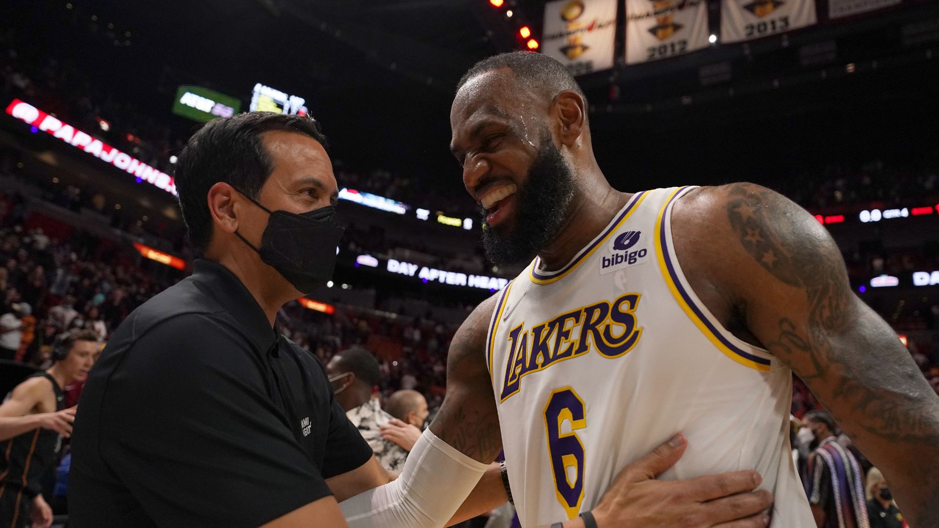 Jan 23, 2022; Miami, Florida, USA; Miami Heat head coach Erik Spoelstra (L) shakes hands with Los Angeles Lakers forward LeBron James (6) after the Miami Heat defeated the Los Angeles Lakers at FTX Arena.