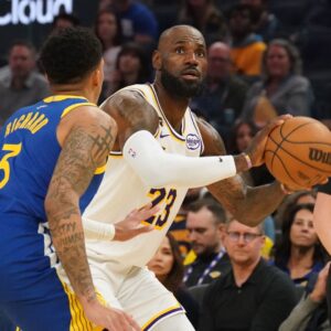 Feb 28, 2026; San Francisco, California, USA; Los Angeles Lakers forward LeBron James (23) is defended by Golden State Warriors guard Will Richard (3) in the first period at Chase Center