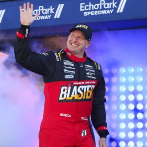 Feb 22, 2026; Hampton, Georgia, USA; NASCAR Cup Series driver Michael McDowell waves during introductions at EchoPark Speedway.