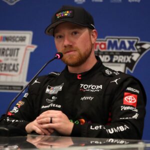 Mar 1, 2026; Austin, Texas, USA; NASCAR Cup Series driver Tyler Reddick (45) addresses the media after winning the NASCAR Cup Series Duramax Texas Grand Prix Powered by RelaDyne at Circuit of the Americas.