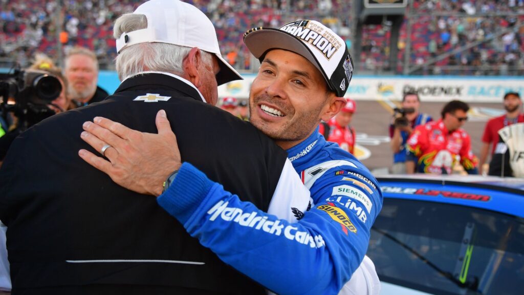 Nov 2, 2025; Avondale, Arizona, USA; NASCAR Cup Series driver Kyle Larson (5) celebrates his championship victory with team owner Rick Hendrick following the Cup Series Championship race at Phoenix Raceway.