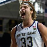 Notre Dame Fighting Irish forward Carson Towt (33) celebrates against the Boston College Eagles during the second half at Purcell Pavilion at the Joyce Center.