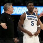 Jan 31, 2026; Memphis, Tennessee, USA; Minnesota Timberwolves guard Anthony Edwards (5) talks with head coach Chris Finch during the fourth quarter against the Memphis Grizzlies at FedExForum.