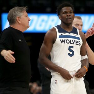 Jan 31, 2026; Memphis, Tennessee, USA; Minnesota Timberwolves guard Anthony Edwards (5) talks with head coach Chris Finch during the fourth quarter against the Memphis Grizzlies at FedExForum.