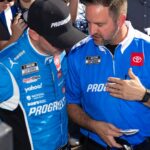 Nov 2, 2025; Avondale, Arizona, USA; NASCAR Cup Series driver Denny Hamlin (11) with crew chief Chris Gayle during the NASCAR Championship race at Phoenix Raceway