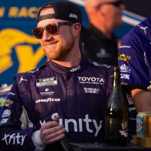 Mar 22, 2026; Darlington, South Carolina, USA; 23XI Racing Tyler Reddick (45) celebrates in Victory Lane after winning at Darlington Raceway