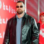 Kansas City Chiefs tight end Travis Kelce (87) arrives prior to the game against the Las Vegas Raiders at GEHA Field at Arrowhead Stadium.