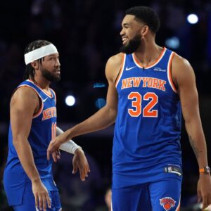 Team Knicks guard Jalen Brunson (11) of the New York Knicks and center Karl-Anthony Towns (32) of the New York Knicks react during the shooting stars competition during the 2026 NBA All Star Saturday Night at Intuit Dome.