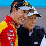 Nov 6, 2022; Avondale, Arizona, USA; NASCAR Cup Series driver Joey Logano celebrates with team owner Roger Penske after winning the Cup Championship at Phoenix Raceway