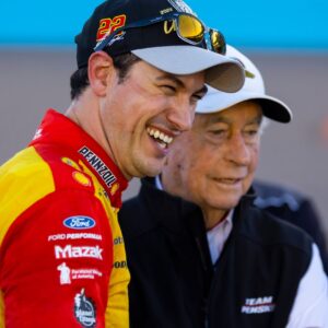 Nov 6, 2022; Avondale, Arizona, USA; NASCAR Cup Series driver Joey Logano celebrates with team owner Roger Penske after winning the Cup Championship at Phoenix Raceway