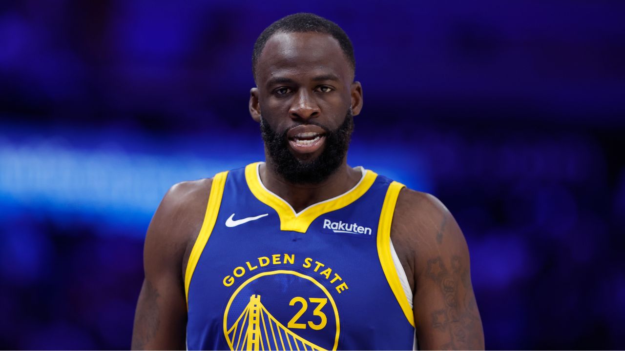 Golden State Warriors forward Draymond Green (23) walks down the court during a time out against the Oklahoma City Thunder during the second half at Paycom Center.