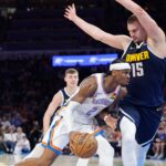 Mar 10, 2025; Oklahoma City, Oklahoma, USA; Oklahoma City Thunder guard Shai Gilgeous-Alexander (2) drives against Denver Nuggets center Nikola Jokic (15) during the second half at Paycom Center.