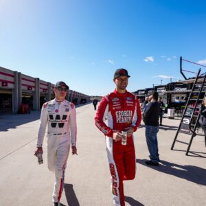 Feb 25, 2024; Hampton, Georgia, USA; NASCAR Cup Series driver Zane Smith (71) and NASCAR Cup Series driver Todd Gilliland (38) walks through the garage prior to qualifying for the Ambetter Health 400 at Atlanta Motor Speedway.