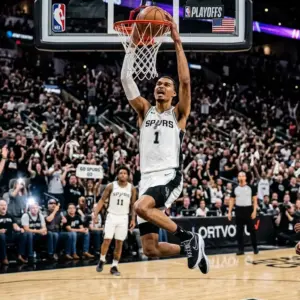 Victor Wembanyama dominates during Spurs playoff game with powerful dunk in white jersey
