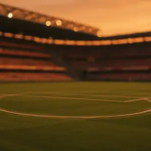 Floodlit stadium pitch at dusk with red-toned atmospheric lighting, packed stands blurred behind, dramatic shadows.