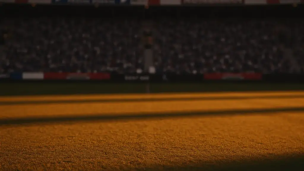 Floodlit stadium pitch at golden hour with packed stands, dramatic shadows, blue-white and red crowd colours.
