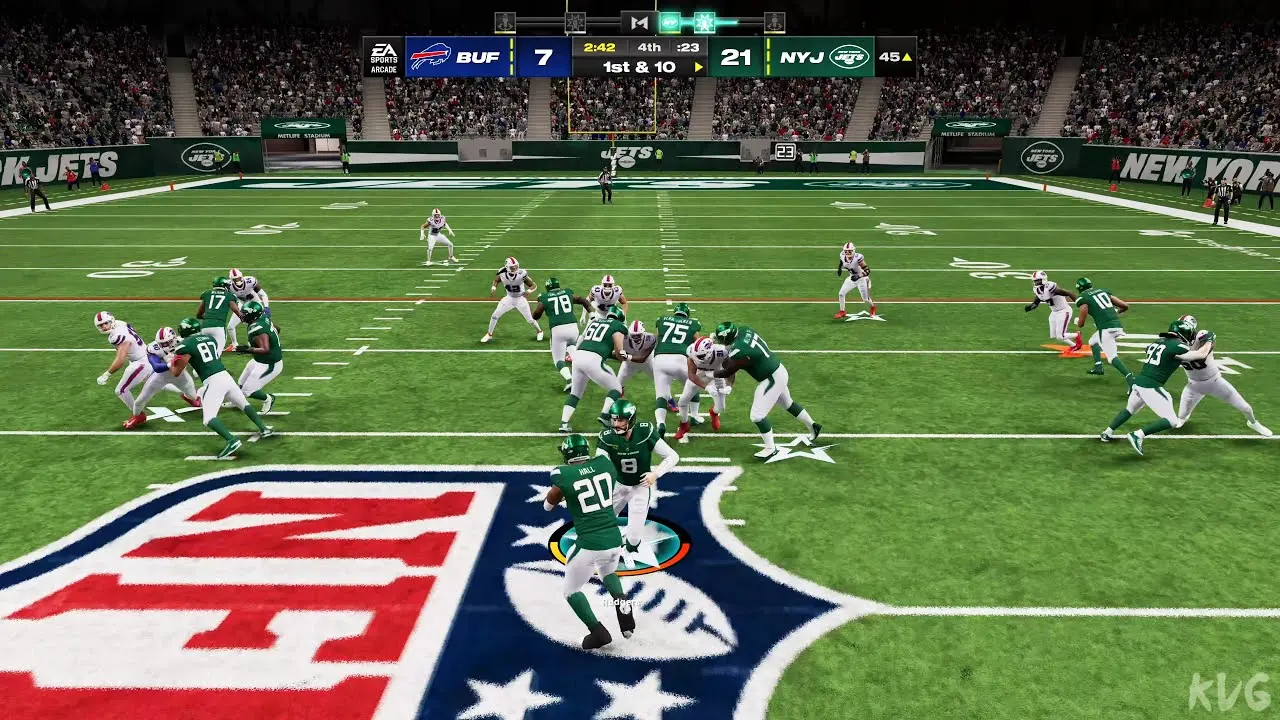 New York Jets players in action against the Buffalo Bills on a football field.