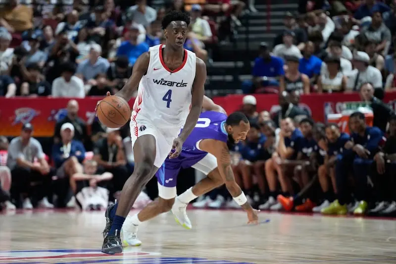 AJ Dybantsa dribbling the basketball during a Summer League game for the Wizards.
