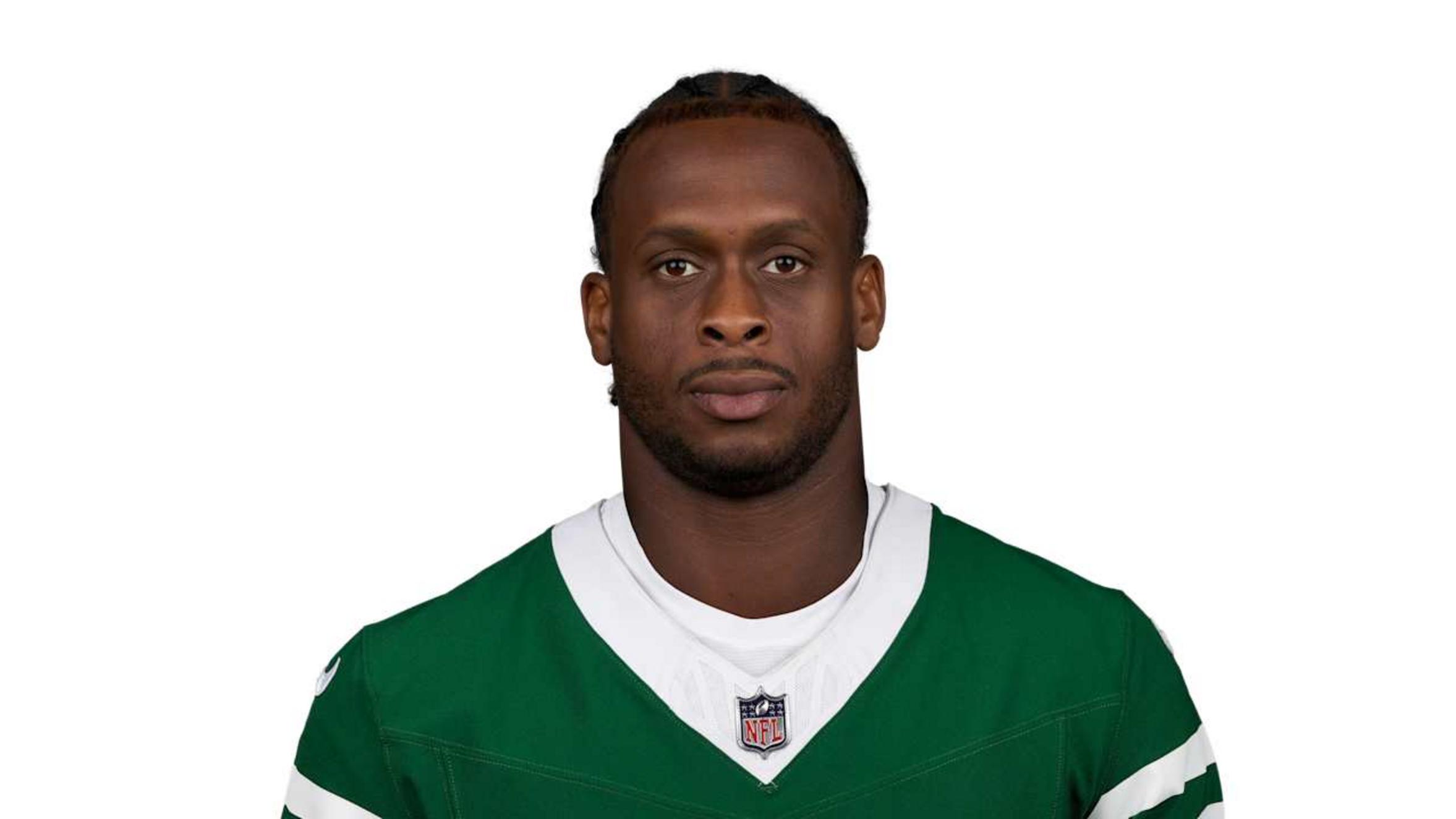 Geno Smith wearing a New York Jets jersey, looking directly at the camera.