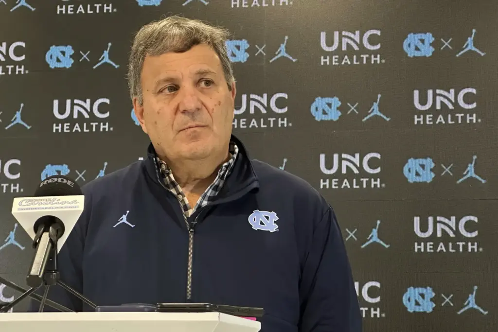 Promotional graphic of Bill Belichick as the North Carolina Tar Heels football head coach