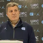 Promotional graphic of Bill Belichick as the North Carolina Tar Heels football head coach
