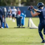 Tight end catching a football during a Los Angeles practice session